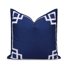 Hofdeco Premium coastal pillow cover with front embroidered Greek key, ideal for outdoor lounging and indoor seating.