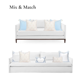 Hofdeco Premium piping detail highlights coastal style on a neutral sofa.