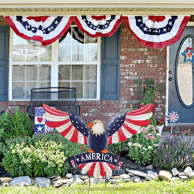 Hogardeck patriotic eagle porch stake pairs with flags for Memorial Day and Independence Day displays.