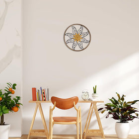 Hogardeck metal frame with decorative scrollwork enhances wall art presence.