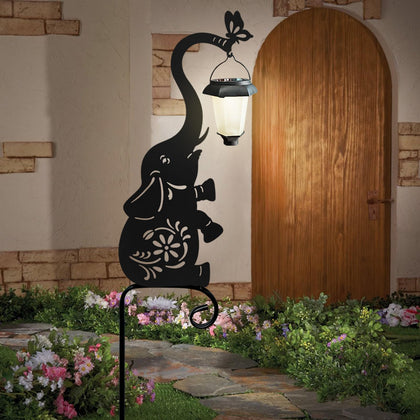 Hokfirm metal elephant solar lantern lights the pathway with a warm, eco-friendly glow.