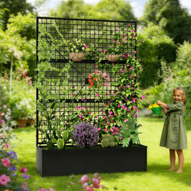 HOLCEPZN planter box demonstrates climbing plants against a green privacy wall.
