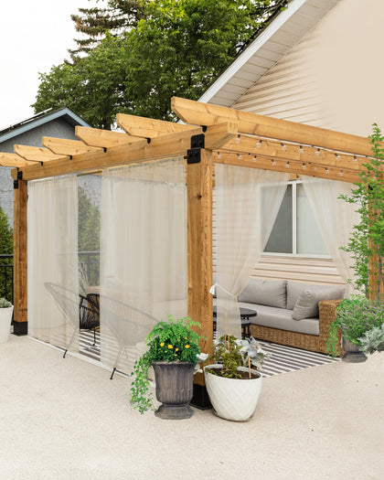 HolidayIdeas outdoor sheer curtains on porch setup provide private, stylish shade.