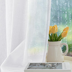 HolidayIdeas white outdoor curtain on porch with sturdy grommets and clean look