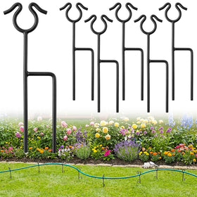 HolyMaji 14-inch garden hose guide spike guiding hoses across a lawn and path.