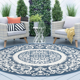 Homcomoda round outdoor rug 8ft blue on patio with durable weave for weather resilience