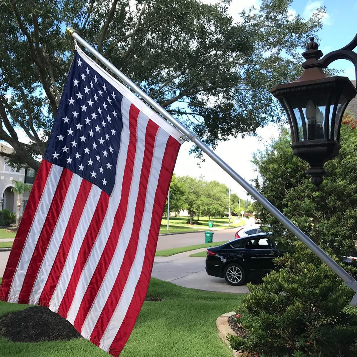 HOME RIGHT American flag in use outdoors demonstrates patriotic display with weather-ready fabric