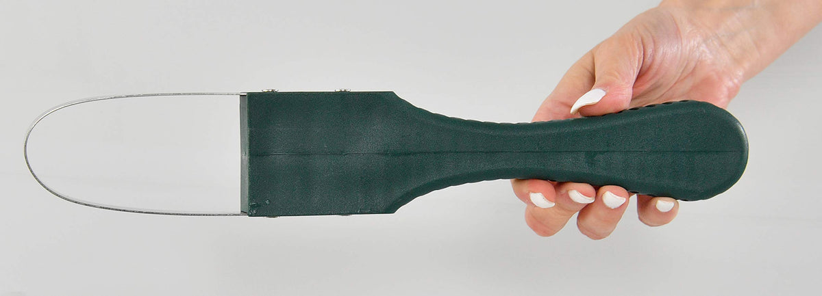 Home-X tool maintains flower beds by removing invasive weeds.