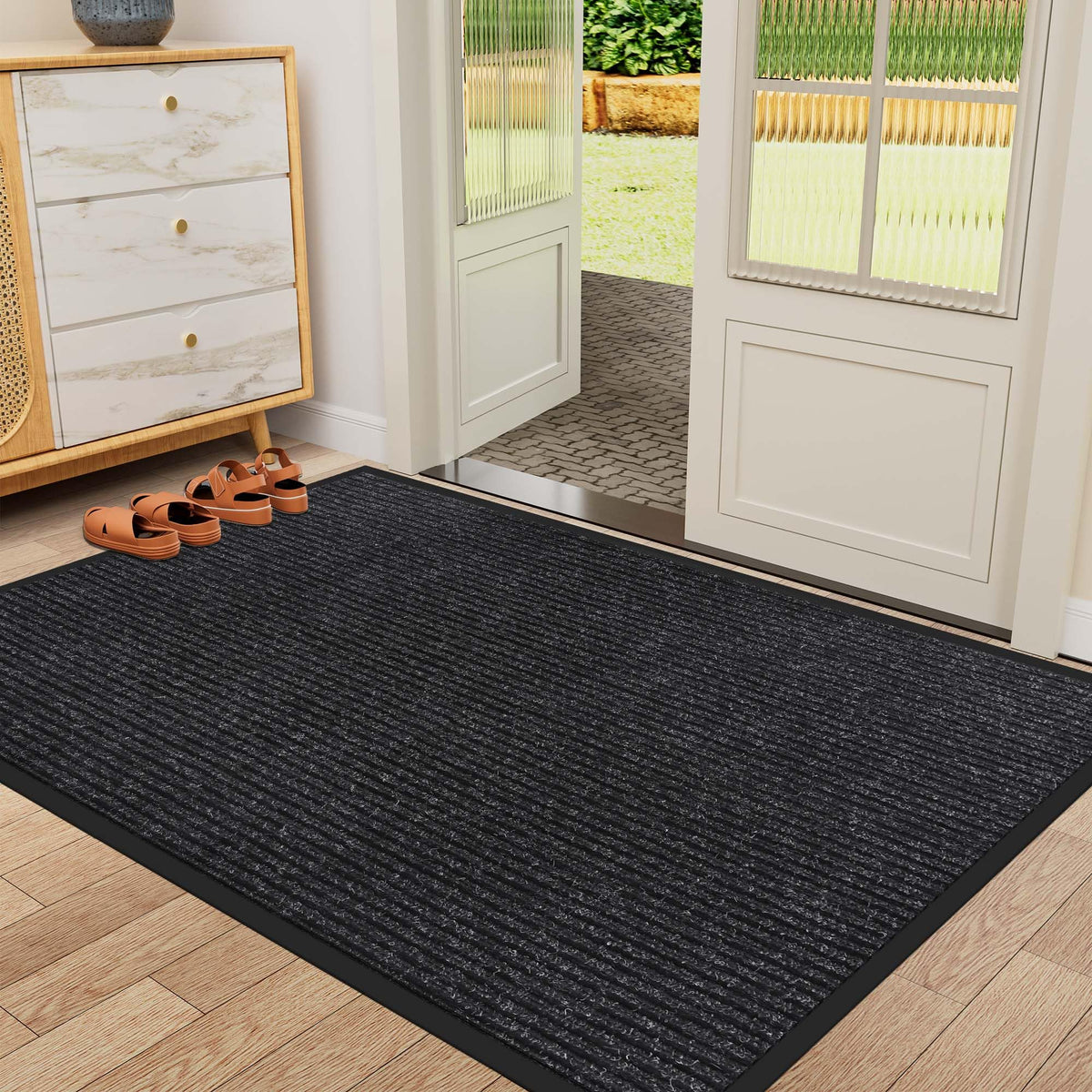 HOMEK 36x60 door mat in front of a larger entryway