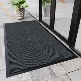 Homek door mat traps dirt and moisture in an active entryway