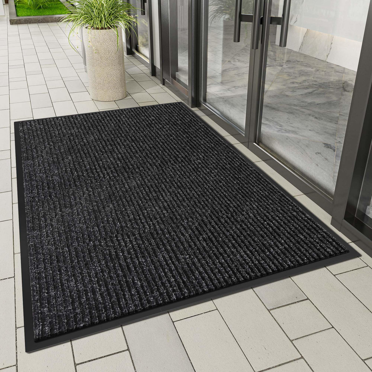 HOMEK door mat close-up highlights non-slip backing for secure placement