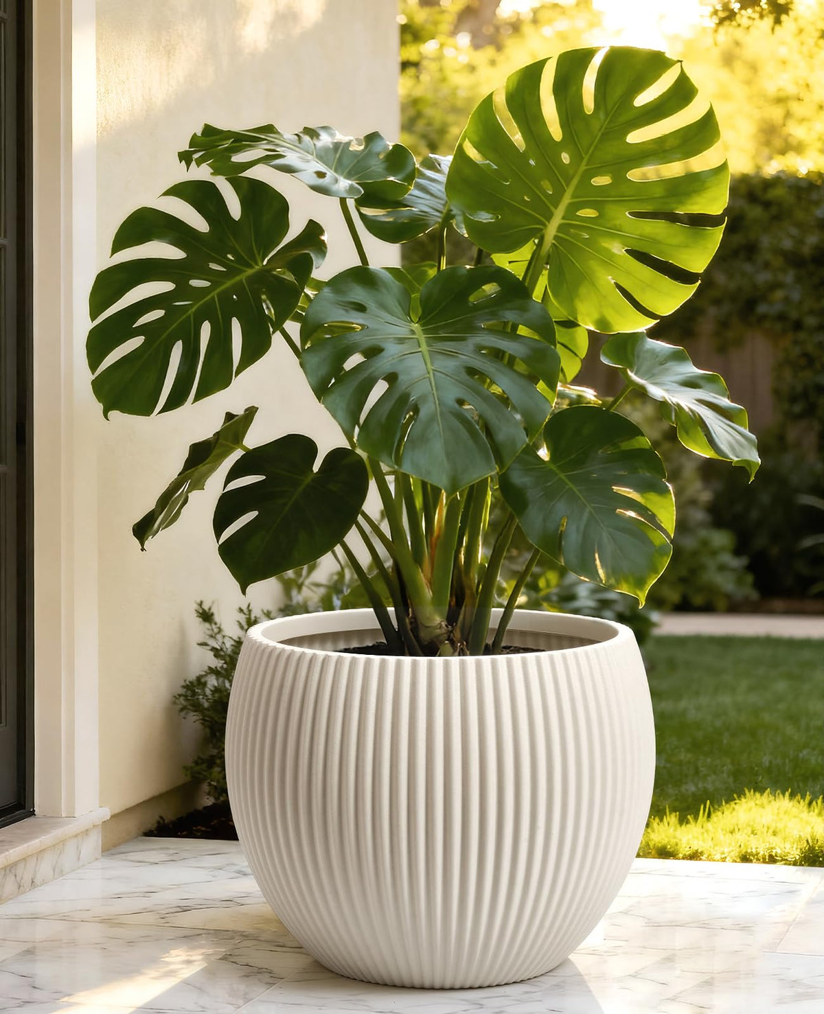 Homenote large plant pot with removable drainage plugs for moisture control.