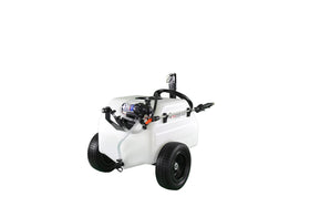 Homestead 12 gallon trailer sprayer ready for field applications behind a mower.
