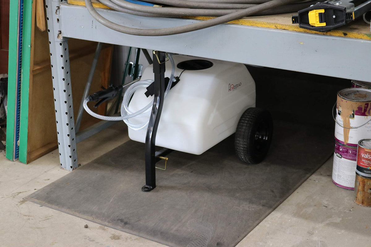 Homestead hose storage hook keeps spray hose off ground during work.