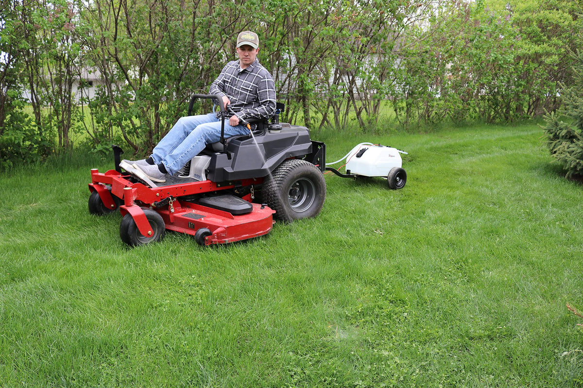 Homestead 5-foot swath broadcast nozzle in action for even turf coverage.