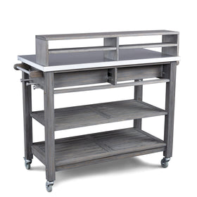 Some assembly required for the Homestyles Maho gray teak potting bench