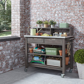 Two drawers and slatted shelves on the Maho bench provide organized tool storage