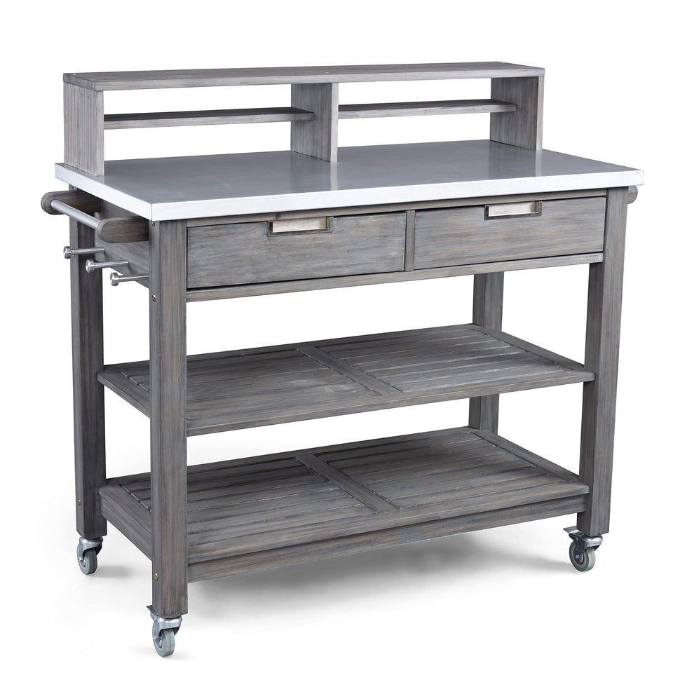 Homestyles Maho potting bench with galvanized steel top for outdoor durability