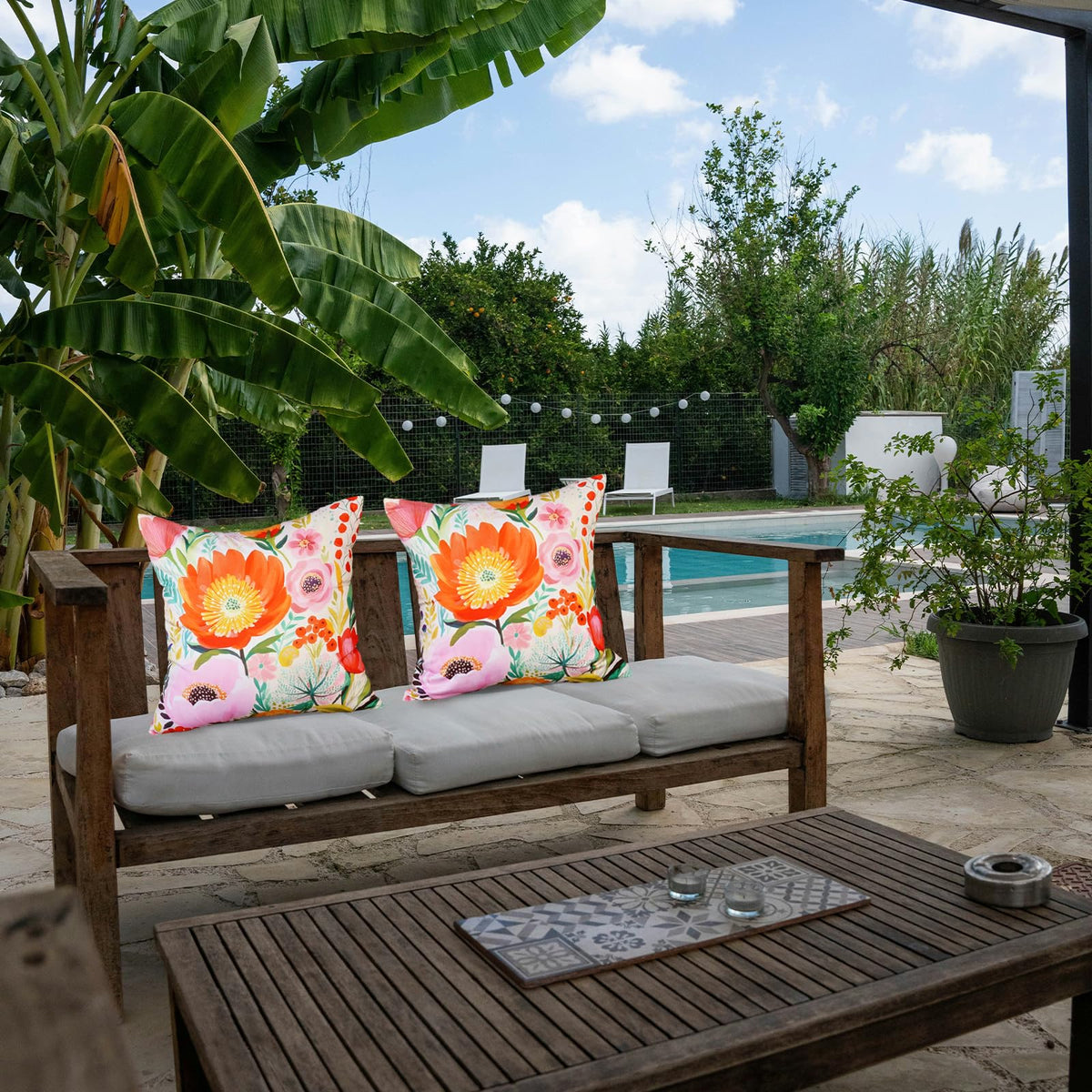 HOMFREEST vibrant floral print brightening sofa, chair, and outdoor seating.