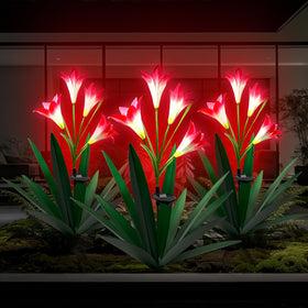 Homight solar metal agave lily sculpture glowing at dusk for outdoor ambience.