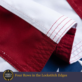 Homissor flag features reinforced edges for durability in wind and weather.