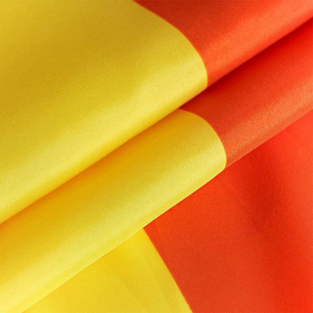 Outdoor banner style Homissor progress flag displayed in a garden or balcony