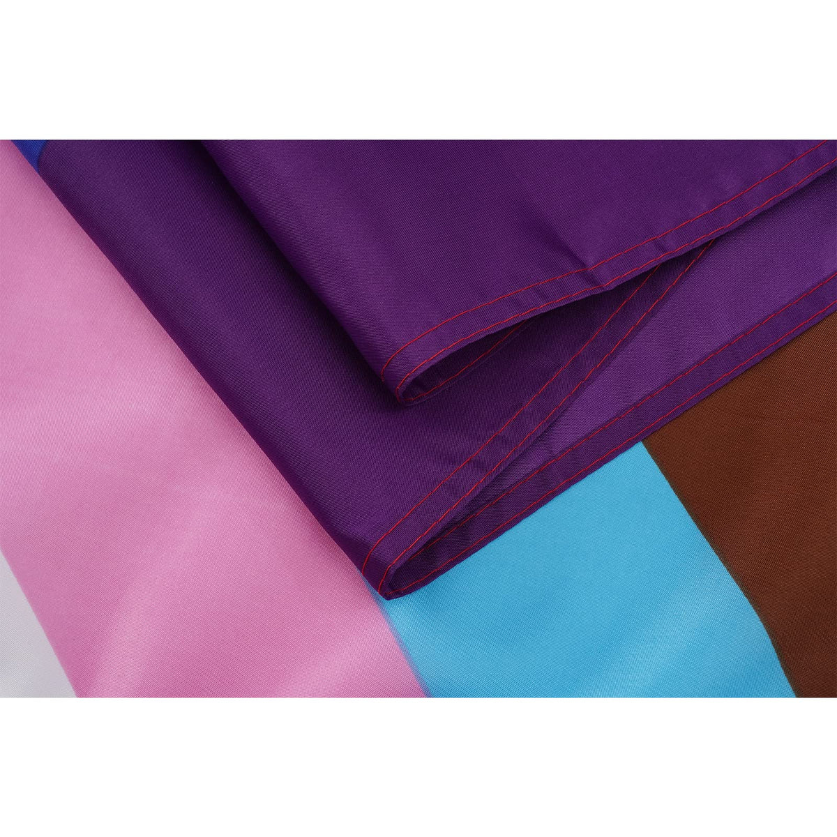 Fabric detail of the Homissor rainbow flag showing sturdy stitching