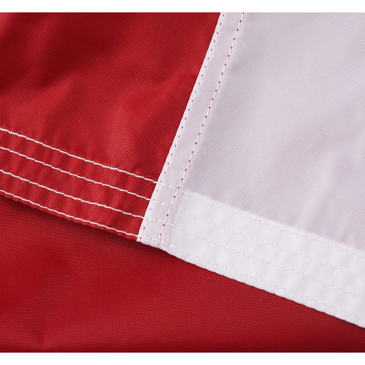 Homissor flag shown fluttering in wind for dramatic outdoor display.