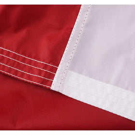 Homissor flag shown fluttering in wind for dramatic outdoor display.