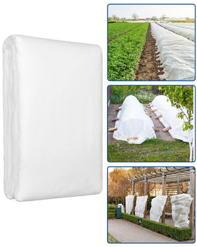Homoda plant covers draped over a 4x8 bed for frost protection.