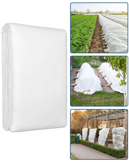 Homoda plant covers draped over a 4x8 bed for frost protection.