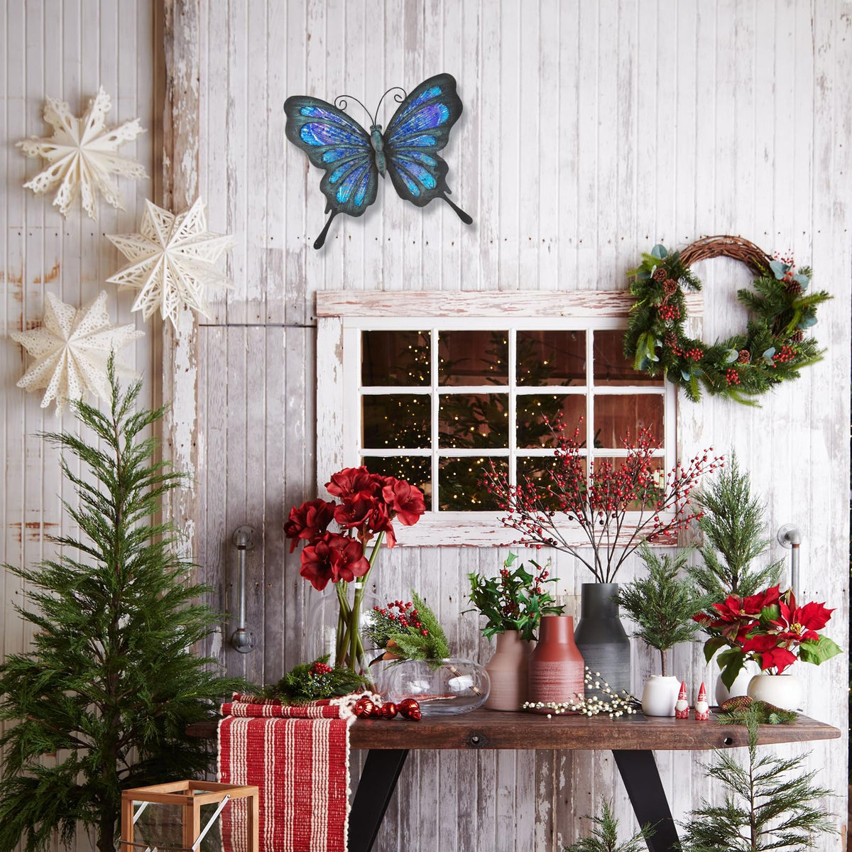 HONGLAND blue glass and metal butterfly decor adds texture