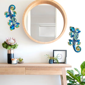 HONGLAND Bohemian blue gecko pair adds whimsical texture to indoor walls.