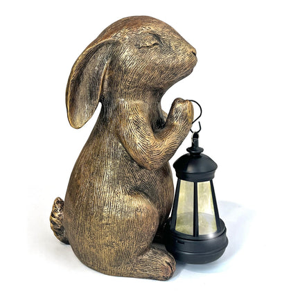 Hongland solar garden rabbit lantern glows softly at dusk, welcoming porches and patios.