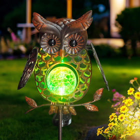HONGLAND solar owl with crack glass ball creates colorful night light for pathways.