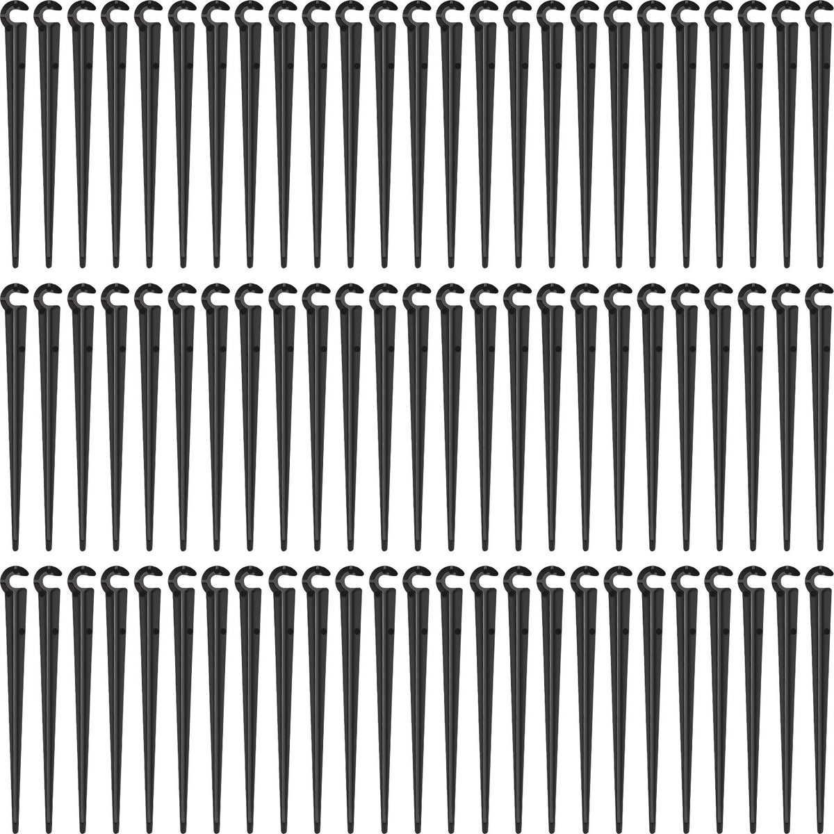Honoson 240-pack irrigation stake set secures tubing in garden beds.