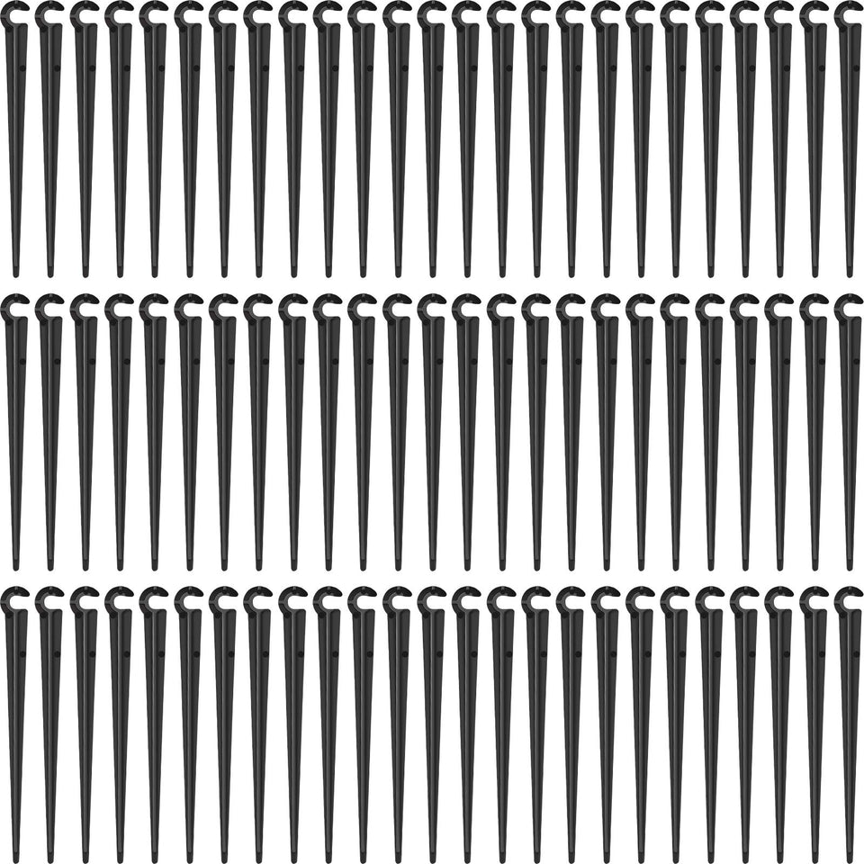 Honoson 240-pack irrigation stake set secures tubing in garden beds.