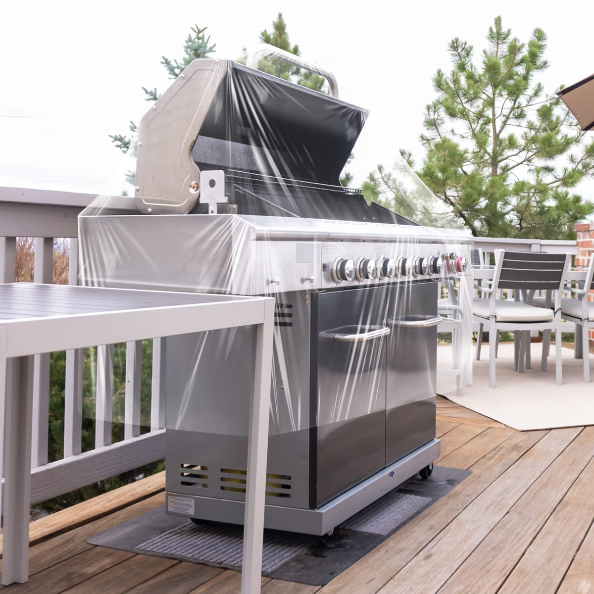 Hoolerry clear-design cover placed on grill for visibility and protection