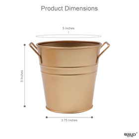 Hosley outdoor patio use gold buckets for seasonal greenery.