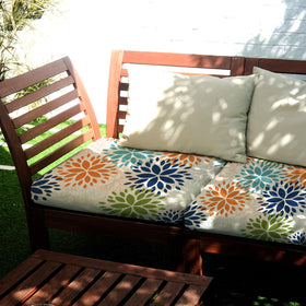 Hosuly Summer Dahlia cushion cover on dining chair demonstrates quick style upgrade.