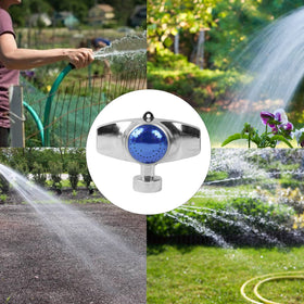 Hourleey sprinkler seen from the side over a flower bed
