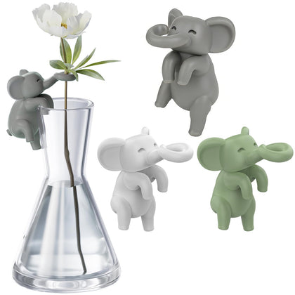 HoWhen Howhen white elephant figurine hanging on edge for propagation support and whimsy.