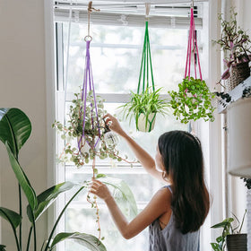 HOWMAX handmade planter using cotton rope offers durable, stylish storage for trailing plants.