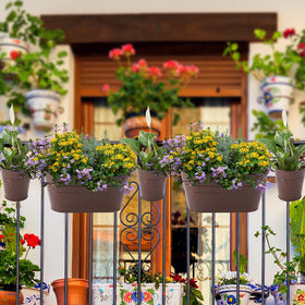HowRU bronze metal planters for flowers, herbs, and decorative displays.
