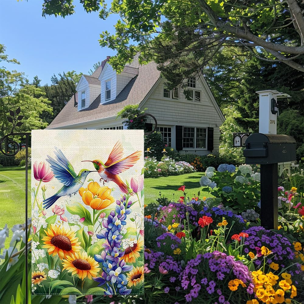 Hsrvivi flowers and hummingbirds close-up emphasizes garden charm.