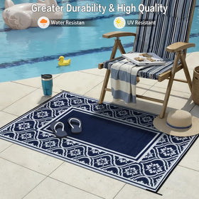 HUGEAR lightweight portable rug folds easily for camping and travel.