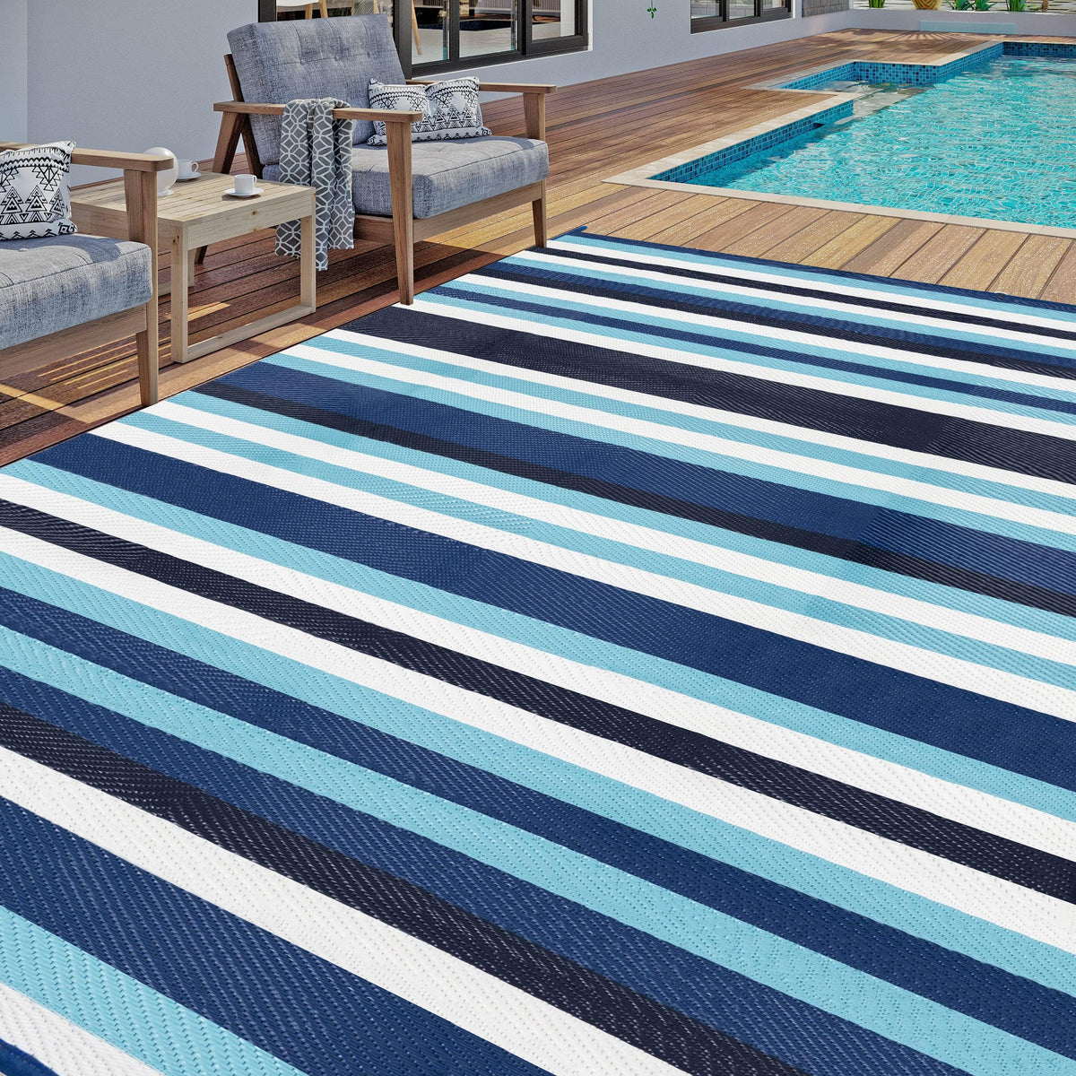 HUGEAR outdoor rug stripe blue/white, ideal for patios and decks, versatile year-round use.