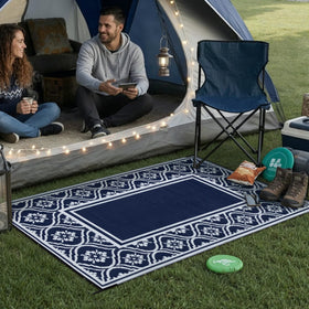 HUGEAR outdoor rug in blue reversible design for patios and decks, protects surfaces.