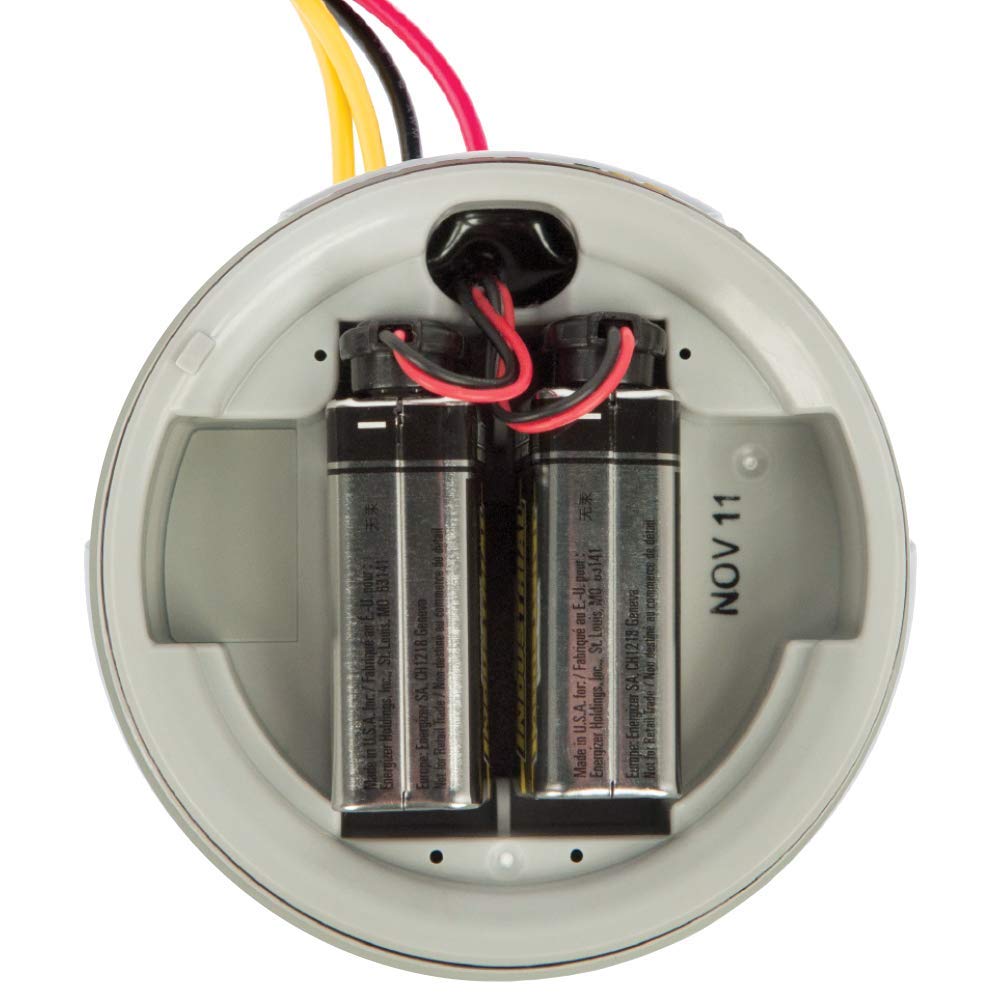 Hunter Node-100-LS waterproof enclosure protecting irrigation controls outdoors.