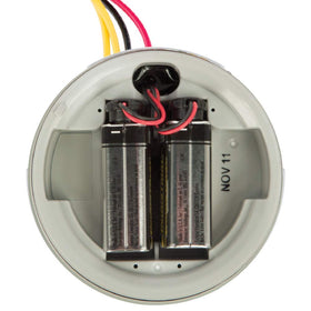 Hunter Node-100-LS waterproof enclosure protecting irrigation controls outdoors.
